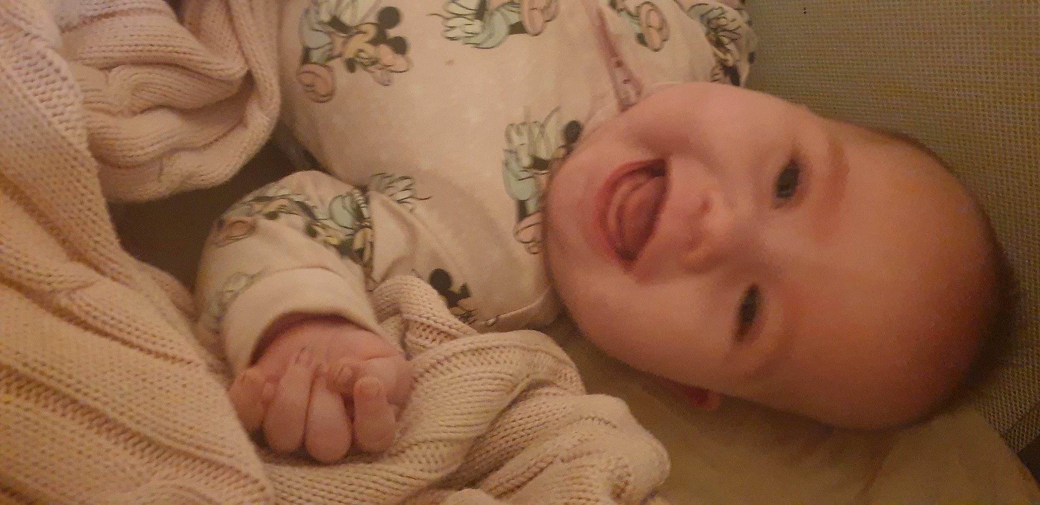 Gracie is registered to the contest to win money with this photo: baby, baby_sleeping, baby_toddler_clothing, bedtime, blanket, cheek, child, comfort, eyebrow, facial_expression, foot, human, linens, lip, nail, nightwear, person, skin, sweater, toddler