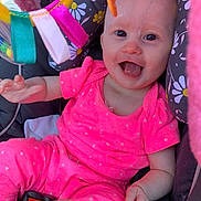 Piper is registered to the contest to win money with this photo: baby, babylaughing, bodypart, clothing, face, finger, hand, happy, head, homedecor, laughing, mouth, person, photography, portrait, purple, smile, t_shirt, teeth, toy