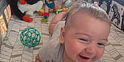 Austin is registered to the contest to win money with this photo: architecture, baby, bed, building, couch, crib, face, furniture, happy, head, homedecor, indoors, infantbed, laughing, person, photography, playarea, plush, portrait, toy
