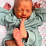 Vienna Bobby Les is registered to the contest to win money with this photo: newborn, baby, infant, sleeping, feet, hands, face, clothing, blanket, knitted, soft, cute, peaceful, cozy, portrait, child, skin, relaxing, indoors, closeup