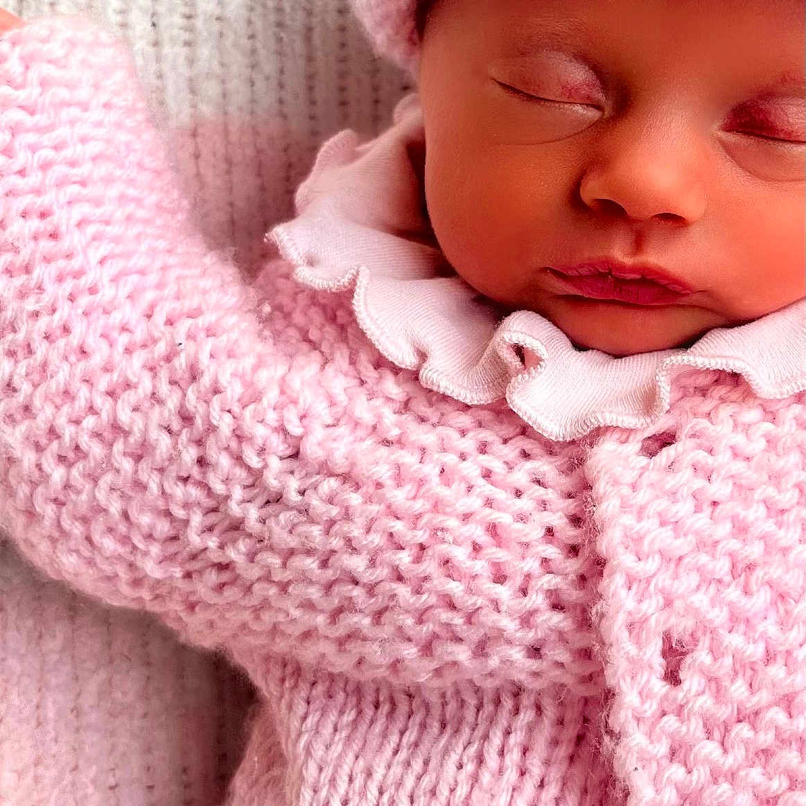 Vienna Bobby Les is registered to the contest to win money with this photo: baby, blanket, child, closeup, clothing, cozy, cute, face, hat, infant, knitted, newborn, peaceful, pink, portrait, rest, sleeping, soft, texture, warm