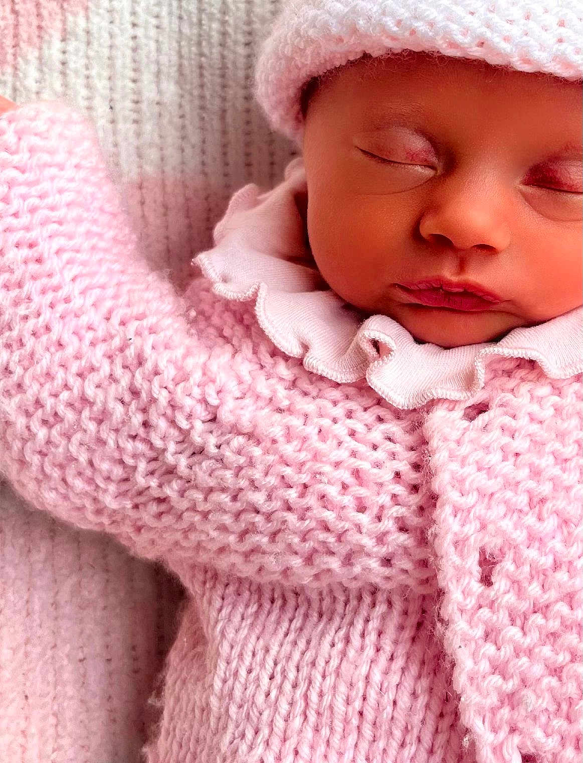Vienna Bobby Les is registered to the contest to win money with this photo: baby, newborn, sleeping, pink, knitted, blanket, hat, soft, cozy, closeup, face, infant, cute, peaceful, child, portrait, rest, warm, clothing, texture