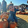 Mesziah is registered to the contest to win money with this photo: child, toddler, pumpkin, pumpkin_patch, denim, boots, outdoor, daylight, people, stroller, autumn, hay, playful, curious, smiling, festival, event, family, crowd, fun