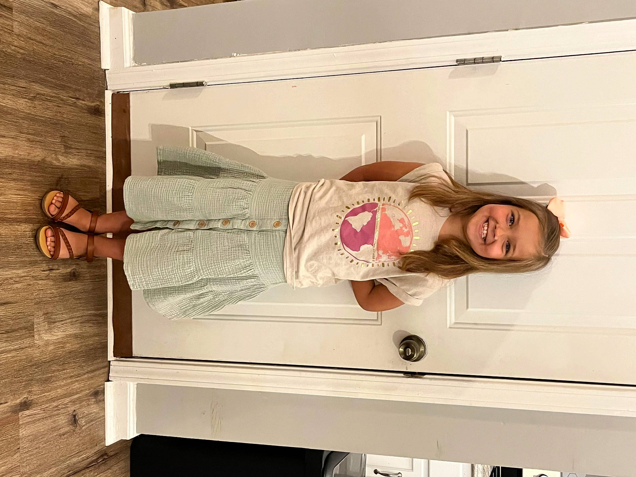 Payton is registered to the contest to win money with this photo: comfort, fashion_design, happy, hardwood, human_leg, joy, magenta, person, room, shelving, smile, stairs, thigh, visual_arts, wood