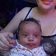 Rayellie-Marie joined the competition — help win amazing prizes! baby, background, casual, clothing, cute, expression, face, family, floral_pajamas, hand, holding, indoor, infant, nail_polish, parent, person, portrait, skin, smiling, woman