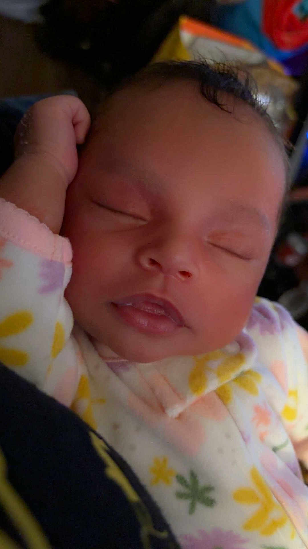 Rayellie-Marie joined the competition — help win amazing prizes! baby, child, closeup, cozy, cute, eyelids, face, floral_pattern, hand, indoors, infant, mouth, newborn, onesie, peaceful, portrait, rest, skin, sleeping, soft_focus