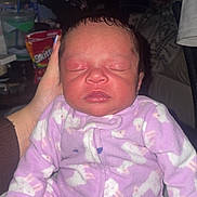 Rayellie-Marie joined the competition — help win amazing prizes! baby, blanket, closed_eyes, cozy, face, furniture, hand, indoor, infant, newborn, onesie, pacifier_clip, patterned_clothing, person, portrait, purple_clothing, skittles, sleeping, snack, soft_lighting