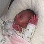 Rayellie-Marie is registered to the contest to win money with this photo: newborn, baby, sleeping, blanket, pink, white, clothing, infant, hand, face, soft, cozy, closeup, portrait, rest, peaceful, cute, indoors, child, wrapped