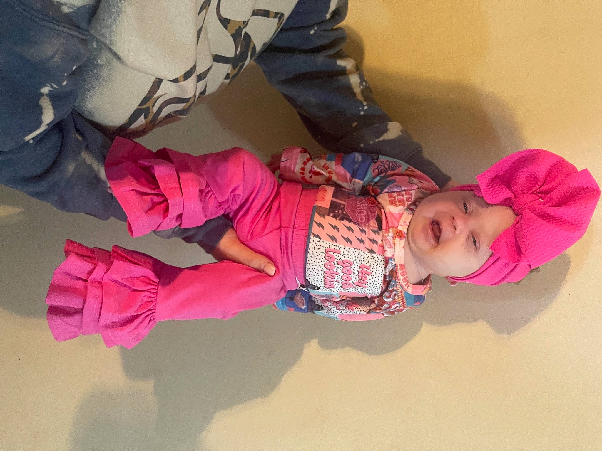 Kyndall joined the competition — help win amazing prizes! arm, baby, baby_toddler_clothing, carmine, child, comfort, fun, happy, headwear, human_body, knee, leisure, magenta, mouth, person, pink, room, sitting, skin, thigh