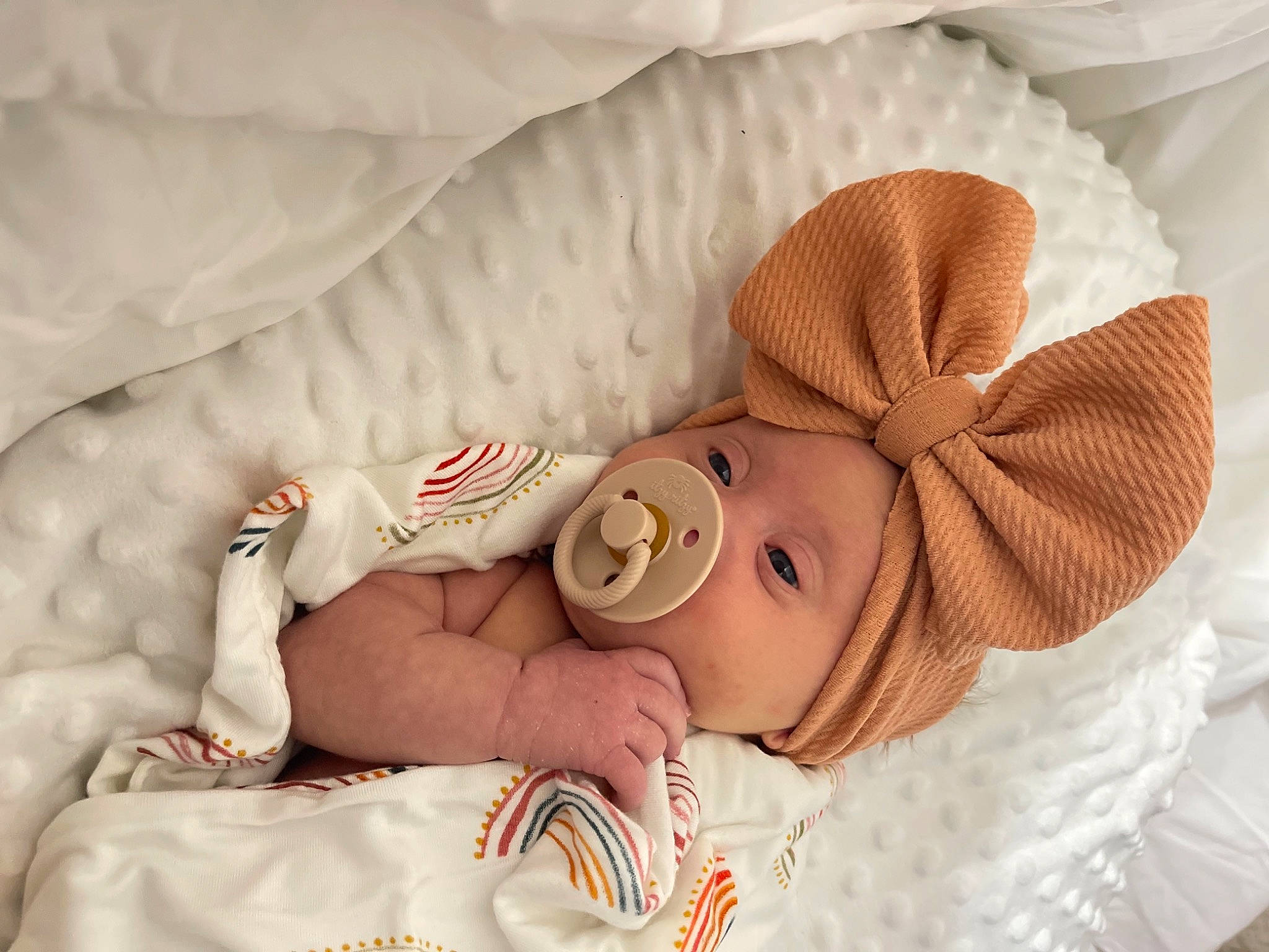 Kyndall is registered to the contest to win money with this photo: baby, baby_products, baby_sleeping, baby_toddler_clothing, bedding, bedtime, child, comfort, face, fur, hat, headgear, linens, nap, peach, person, portrait_photography, room, toddler, towel