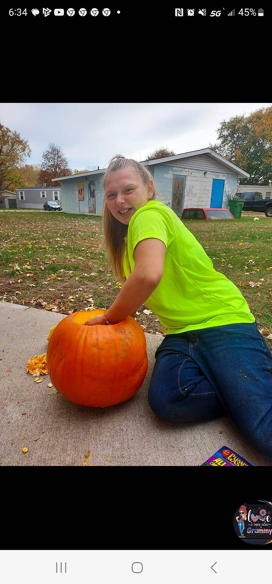 Jazmyn joined the competition — help win amazing prizes! calabaza, cucurbita, fruit, gourd, grass, happy, joy, local_food, natural_foods, people_in_nature, person, plant, produce, pumpkin, sitting, sky, smile, squash, tree, vegetable