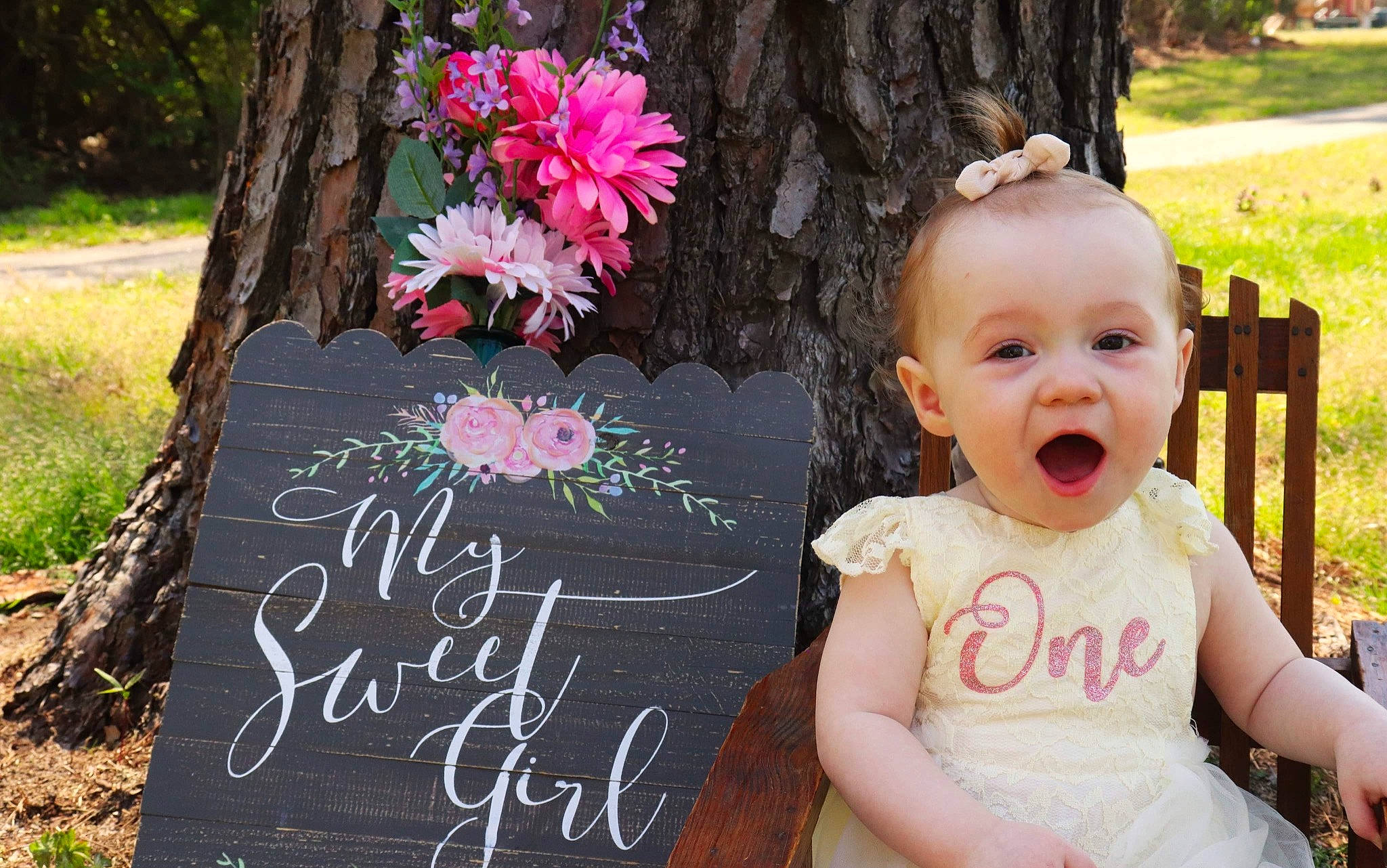 Georgia is registered to the contest to win money with this photo: baby, baby_toddler_clothing, beauty, chalk, child, dress, event, flower, grass, green, handwriting, happy, magenta, people_in_nature, person, petal, pink, plant, summer, toddler