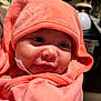 baby, child, close_up, coral_color, cozy, cute, face, happy, hooded_towel, indoors, infant, kitchen, newborn, person, portrait, skin, smile, soft_texture, warm_light, wrapped