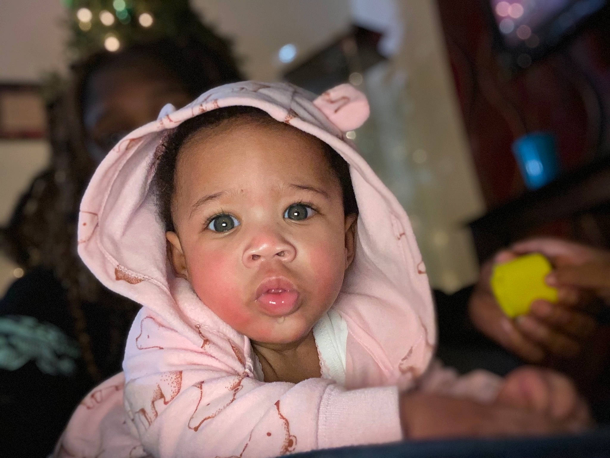 Lianna is registered to the contest to win money with this photo: baby, baby_toddler_clothing, cheek, child, child_model, eye, hood, hoodie, iris, mouth, nose, person, pink, portrait_photography, sweetness, toddler