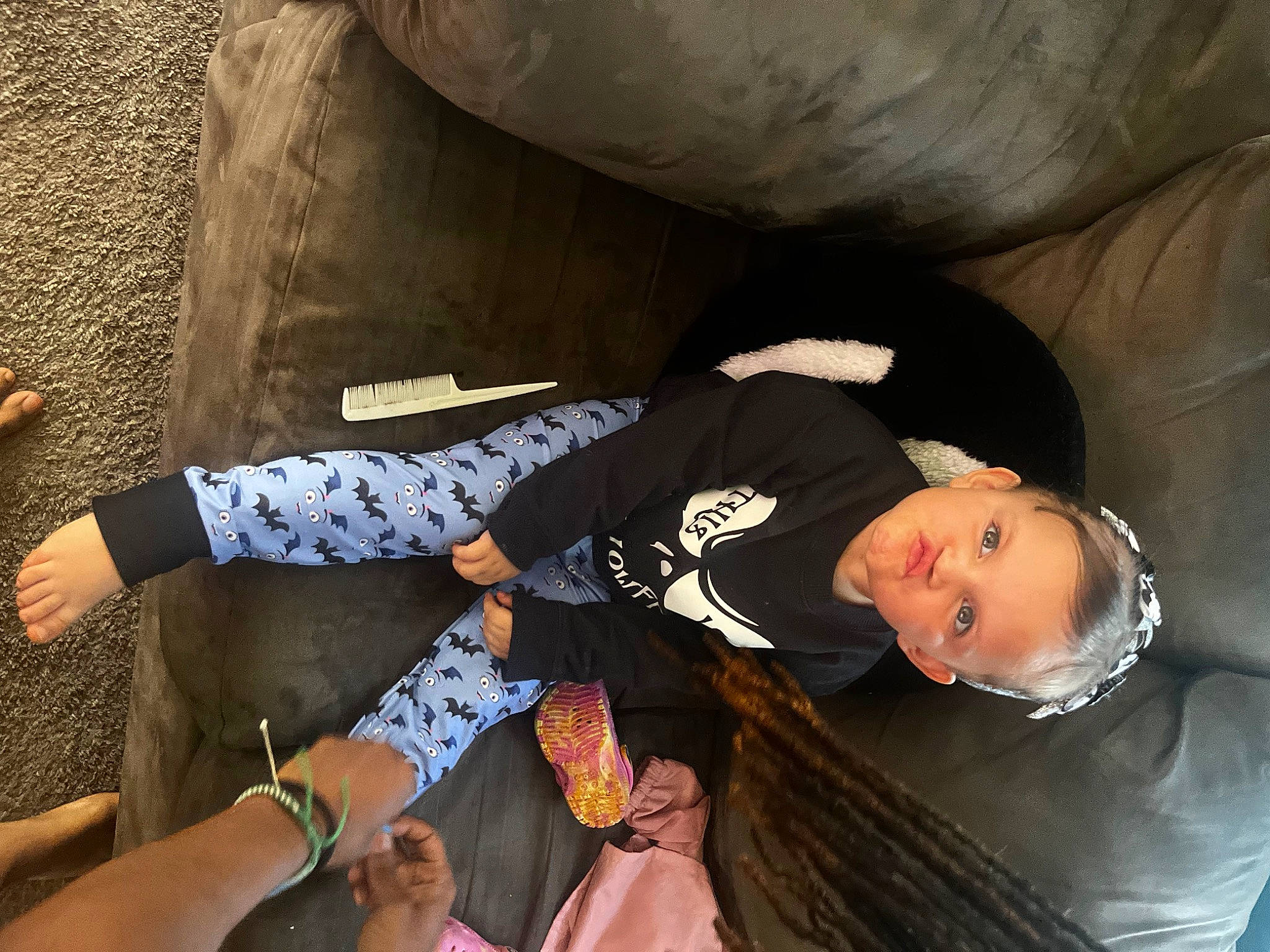 Lilyana joined the competition — help win amazing prizes! black_hair, child, elbow, foot, fun, hat, human_body, human_leg, jewellery, knee, leg, leisure, nail, people, person, sandal, sitting, sun_hat, thigh, tree