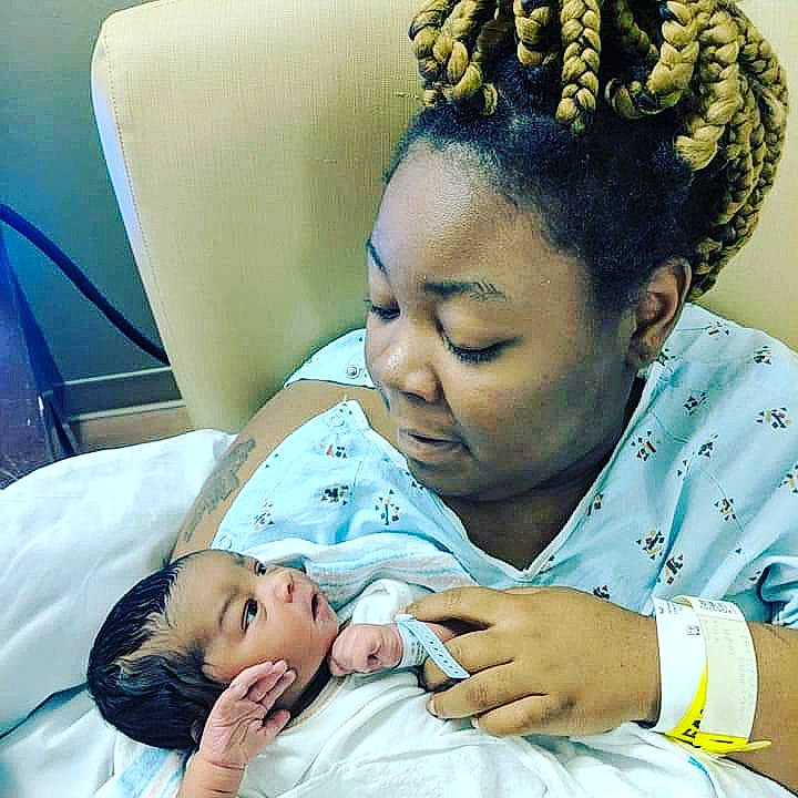 Jermaine is registered to the contest to win money with this photo: child, childbirth, daughter, ear, eye, father, forehead, girl, hairstyle, head, human, infant, mother, nose, person, product