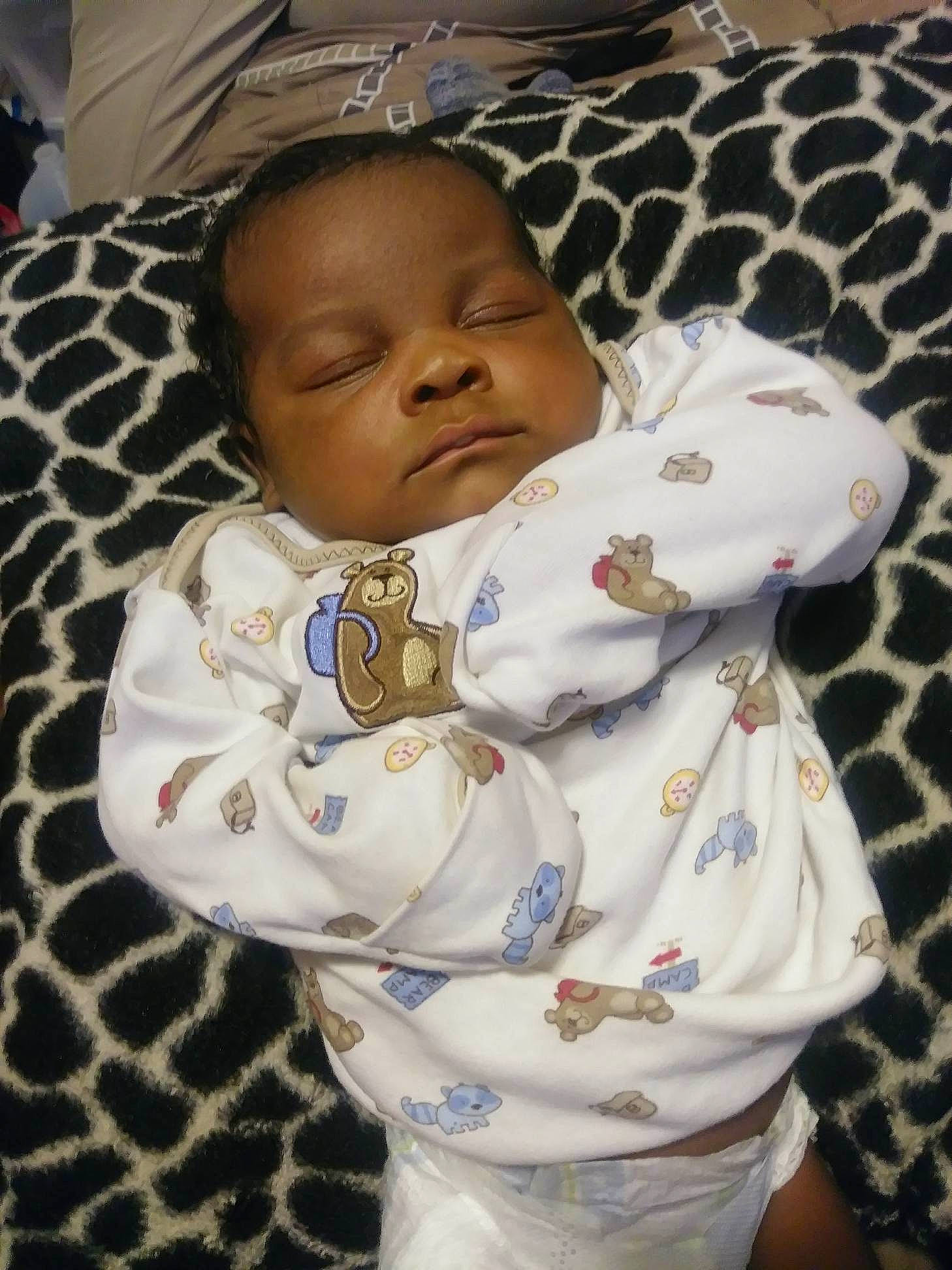 Jermaine joined the competition — help win amazing prizes! arm, baby_products, boy, child, day, girl, infant, person, product, skin, smile, textile, toddler, white