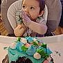 toddler, child, cake, blue_frosting, high_chair, birthday, messy, hands, face, food, celebration, indoor, person, cute, cream, icing, happy, young_child, table, party