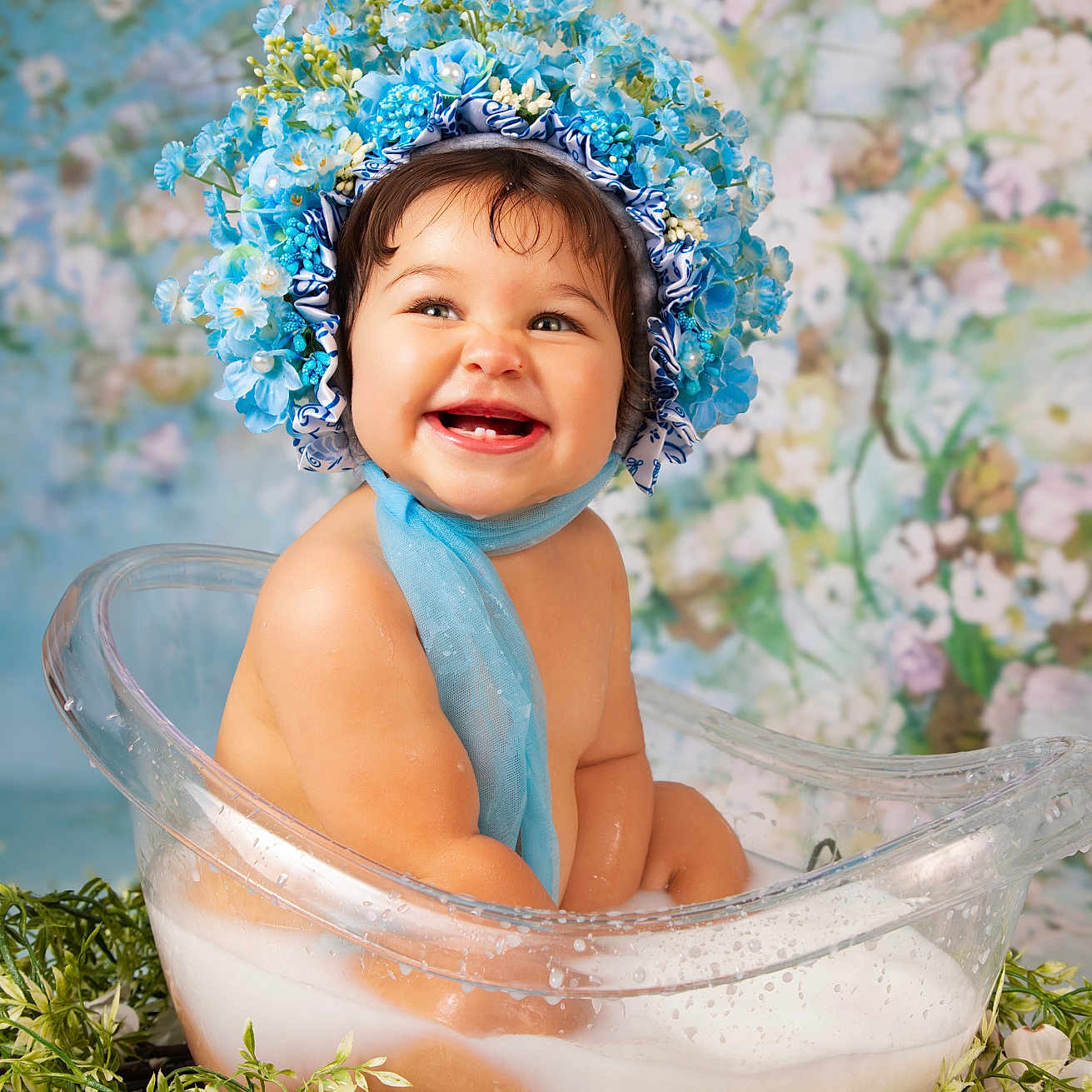 Alena joined the competition — help win amazing prizes! baby, blue_bonnet, child, clear_tub, cute, floral_background, flower_crown, greenery, happy, infant, innocence, milky_bath, nature, portrait, scarf, sitting, skin, smiling, studio_photo, water