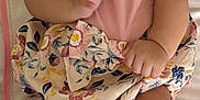 Anivia joined the competition — help win amazing prizes! baby, infant, smiling, headband, curly_hair, pink_clothing, floral_pattern, blanket, lying_down, skin, hand, foot, cute, child, person, indoors, soft_toys, adorable, happy, portrait