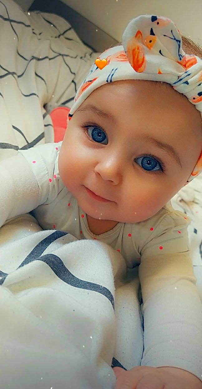 Ilyana a rejoint le concours — aidez-le/la à gagner de superbes lots ! arm, baby, baby_toddler_clothing, cap, cheek, comfort, eye, eyebrow, finger, happy, hat, head, headgear, headwear, human_body, iris, lip, nose, person, skin