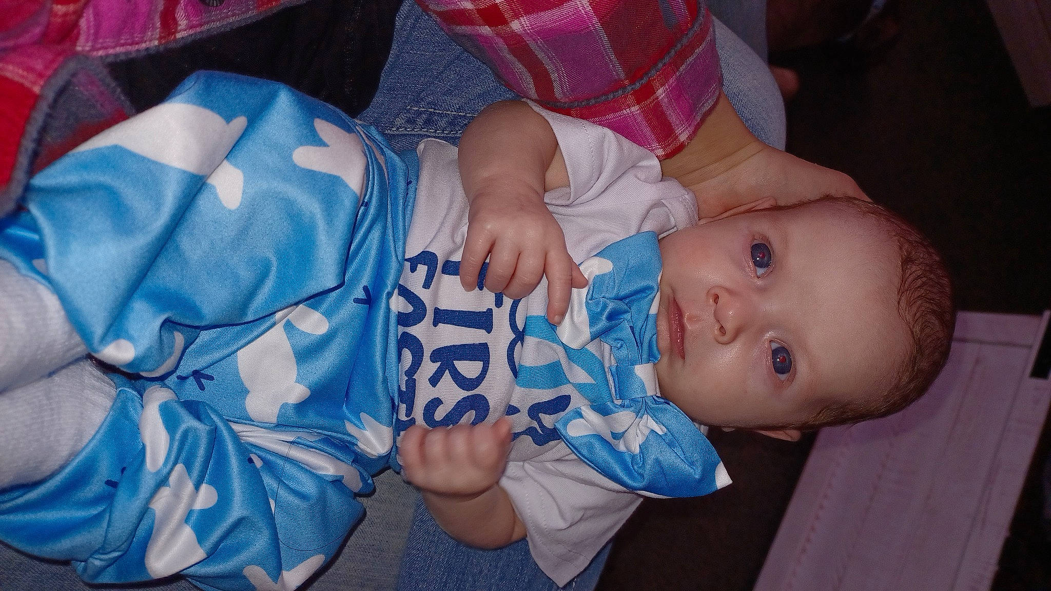 Bentley joined the competition — help win amazing prizes! baby, baby_toddler_clothing, cheek, child, comfort, electric_blue, finger, gesture, hand, happy, human_body, mouth, nail, pattern, person, sitting, skin, smile, textile, thumb