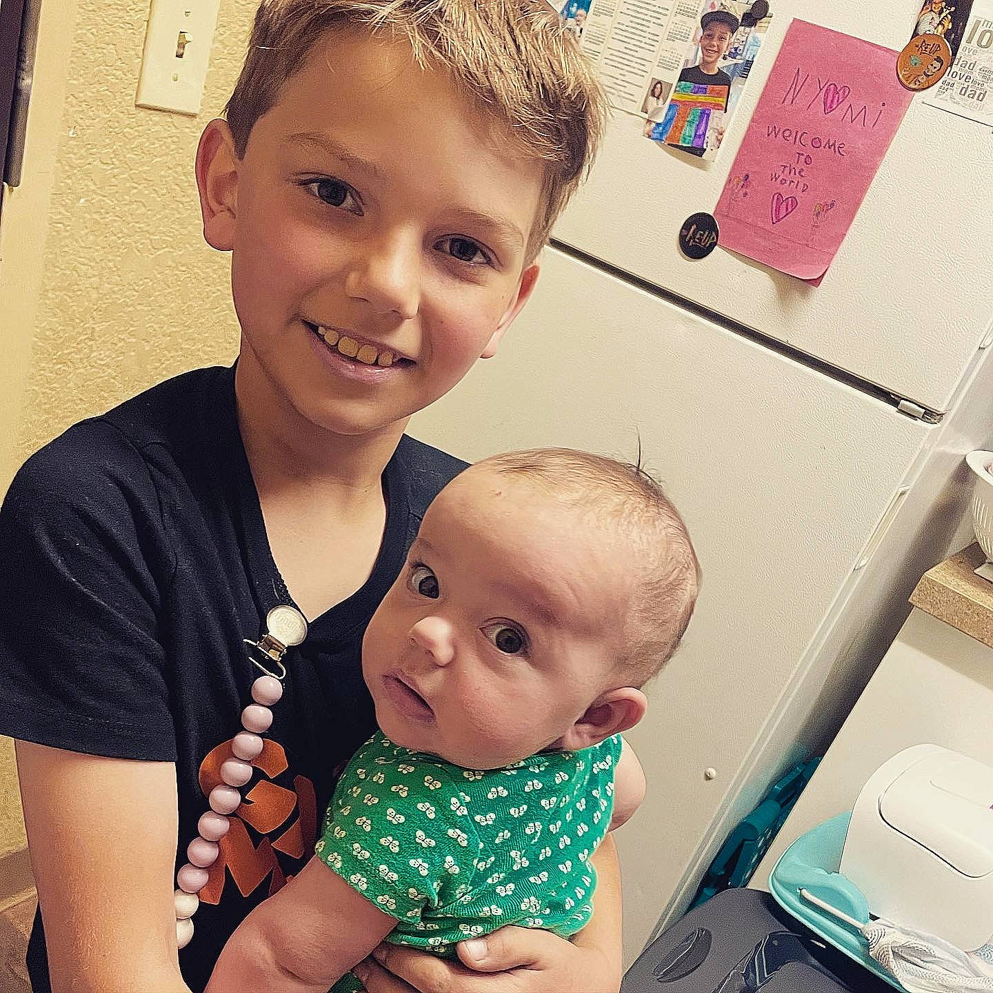 Prince is registered to the contest to win money with this photo: arm, cheek, ear, eye, eyebrow, eyelash, face, facial_expression, hair, hairstyle, happy, head, joy, mouth, muscle, neck, organ, person, photograph, sleeve