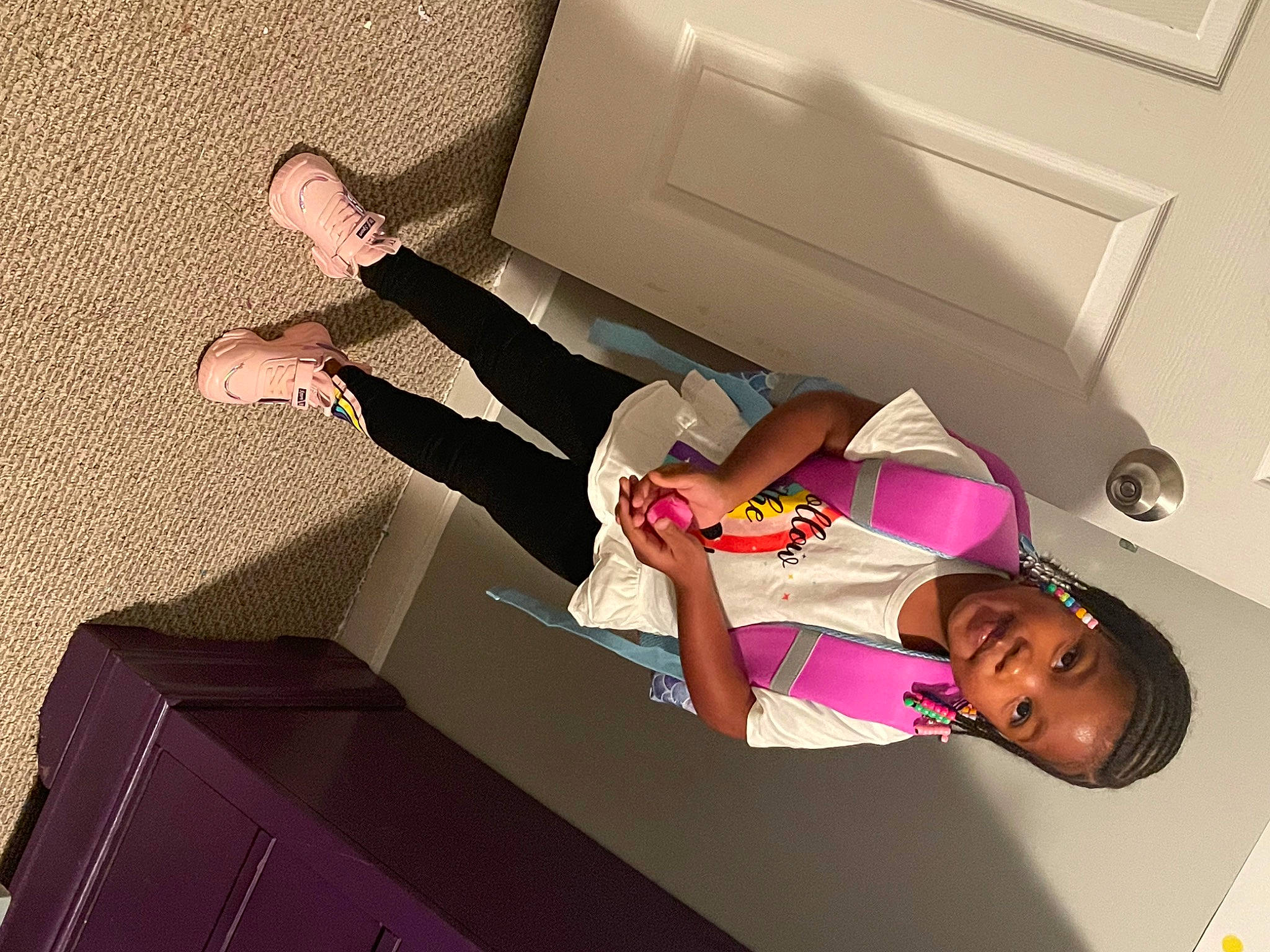 Cadence is registered to the contest to win money with this photo: automotive_design, bed, comfort, elbow, fashion_design, finger, flooring, fun, gesture, human_leg, knee, lap, leg, magenta, person, pink, room, sandal, shoulder, thigh