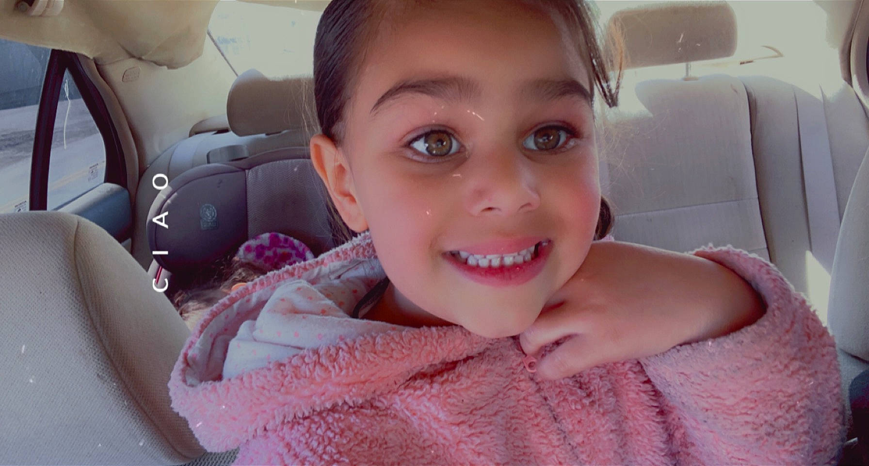 Riniyah joined the competition — help win amazing prizes! car, car_seat, cheek, chin, comfort, eyebrow, eyelash, happy, head_restraint, iris, jaw, joy, lip, mouth, nose, person, pink, skin, smile, toddler