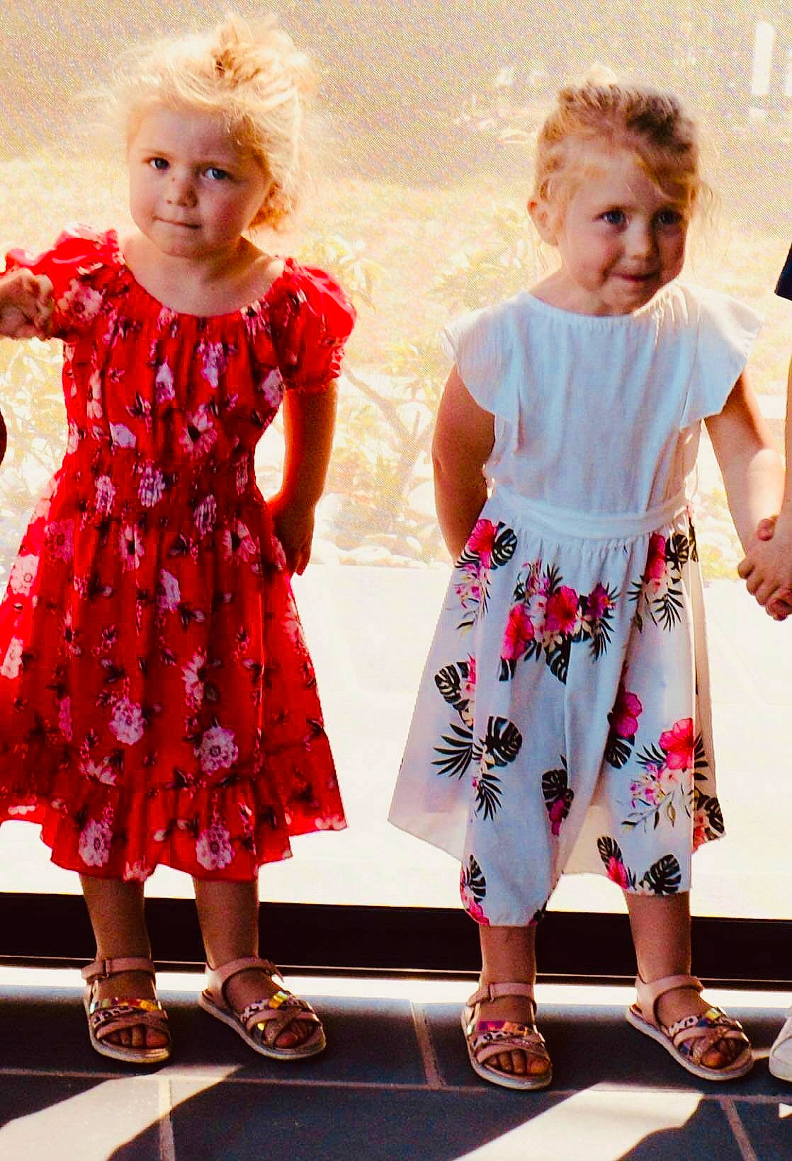 Camilya participe au concours pour gagner de l'argent avec cette photo : baby_toddler_clothing, day_dress, dress, facial_expression, fashion, fun, gesture, happy, joint, joy, magenta, one_piece_garment, pattern, person, pink, shoulder, sleeve, smile, standing, summer