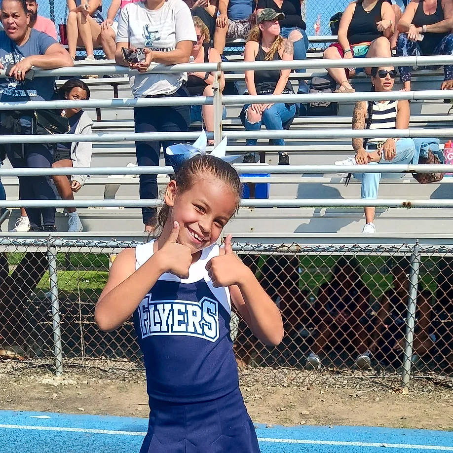 Maria is registered to the contest to win money with this photo: anger, blue, clothing, community, competition_event, fence, fun, happy, headwear, joy, leisure, mammal, muscle, people, person, player, recreation, snapshot, sports, sports_uniform