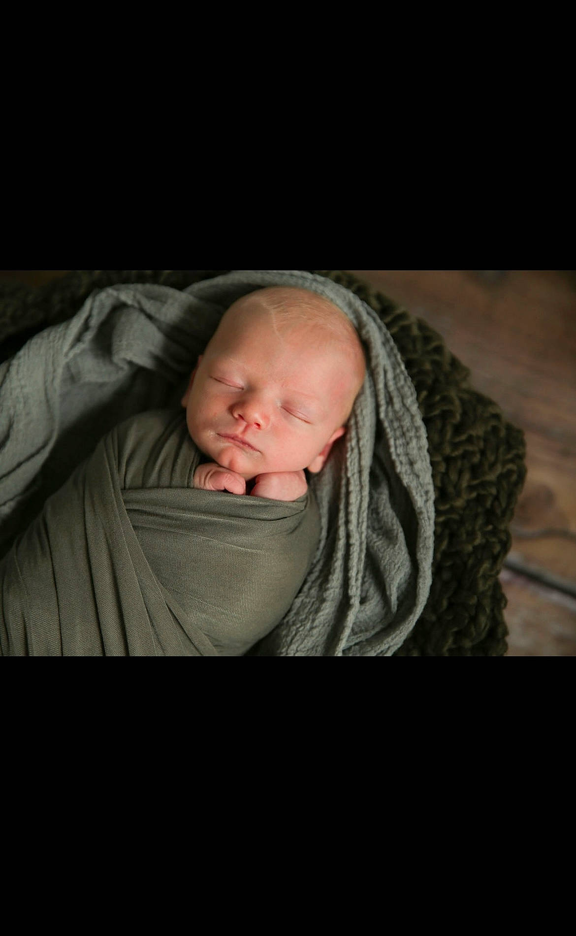 Kingston is registered to the contest to win money with this photo: baby, baby_toddler_clothing, cheek, comfort, darkness, eyebrow, flash_photography, fun, grass, grey, happy, linens, nose, person, portrait_photography, room, sitting, sleeve, smile, toddler