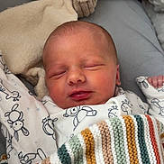 Freddie joined the competition — help win amazing prizes! baby, bed, blanket, bunny, child, closeup, cozy, cute, fabric, indoors, infant, knit_blanket, newborn, patterned_clothing, peaceful, plush_toy, portrait, resting, sleeping, soft_toy