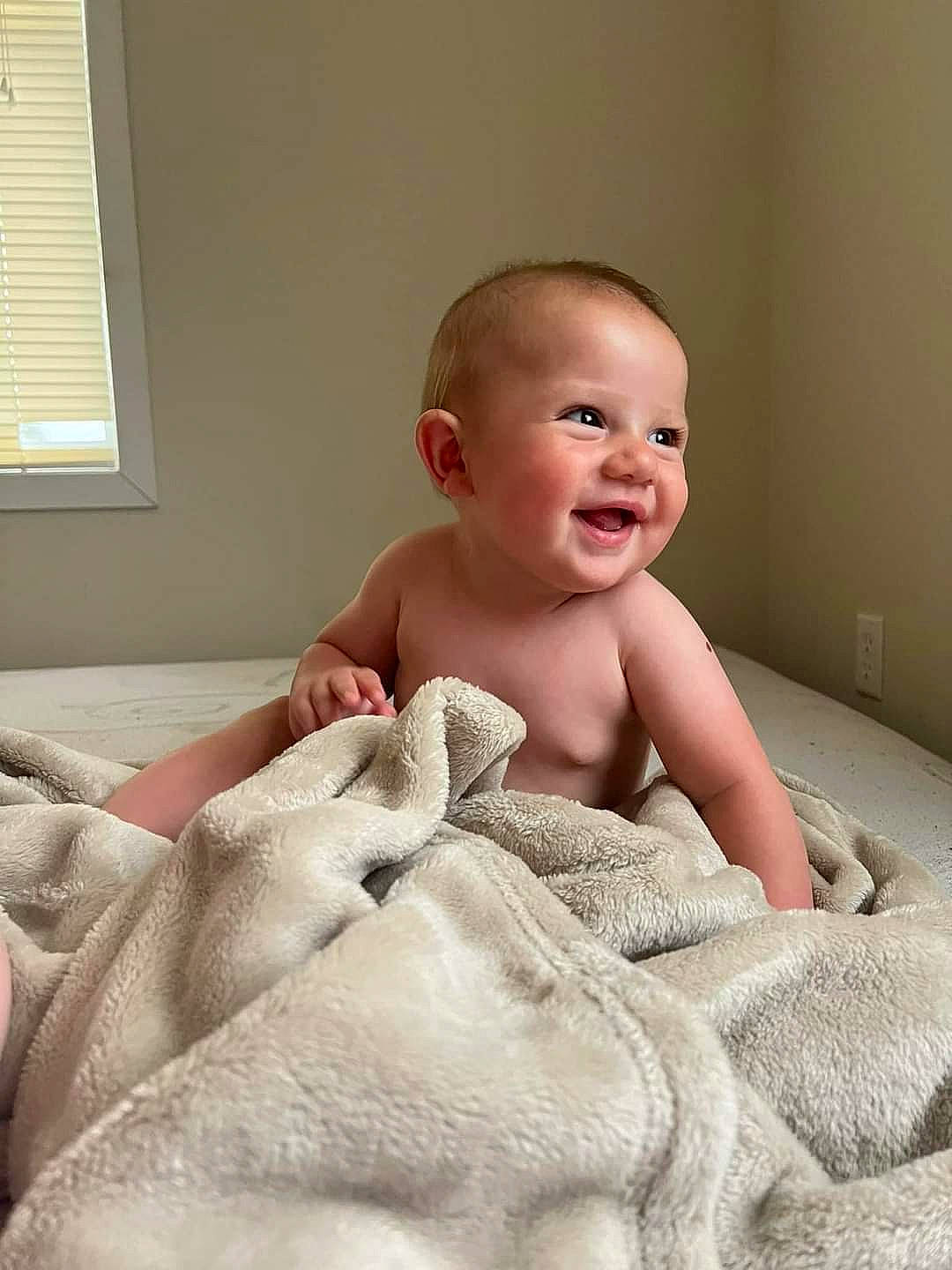 Oaklee joined the competition — help win amazing prizes! abdomen, baby, baby_toddler_clothing, cheek, chest, child, comfort, flooring, happy, linens, person, room, sitting, skin, sleeve, smile, stomach, thumb, toddler, window