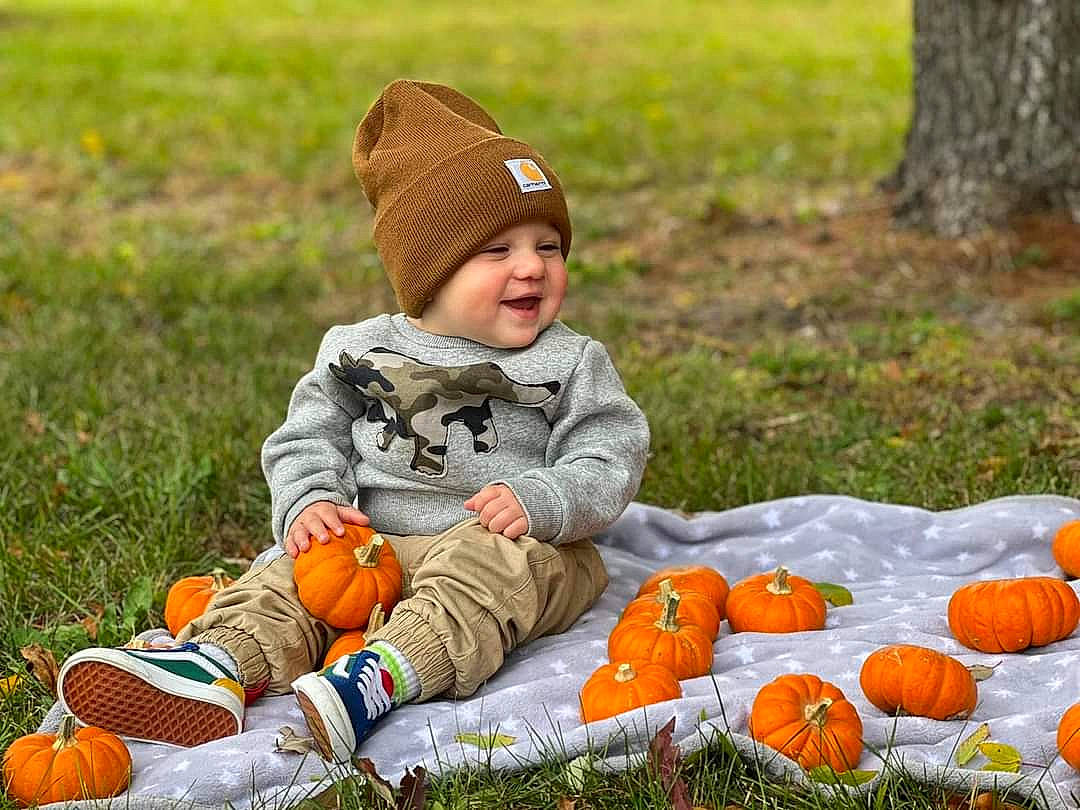 Oaklee joined the competition — help win amazing prizes! baby, baby_toddler_clothing, calabaza, cap, child, face, grass, happy, headwear, joy, leaf, natural_foods, orange, outerwear, people, people_in_nature, person, photograph, plant, pumpkin