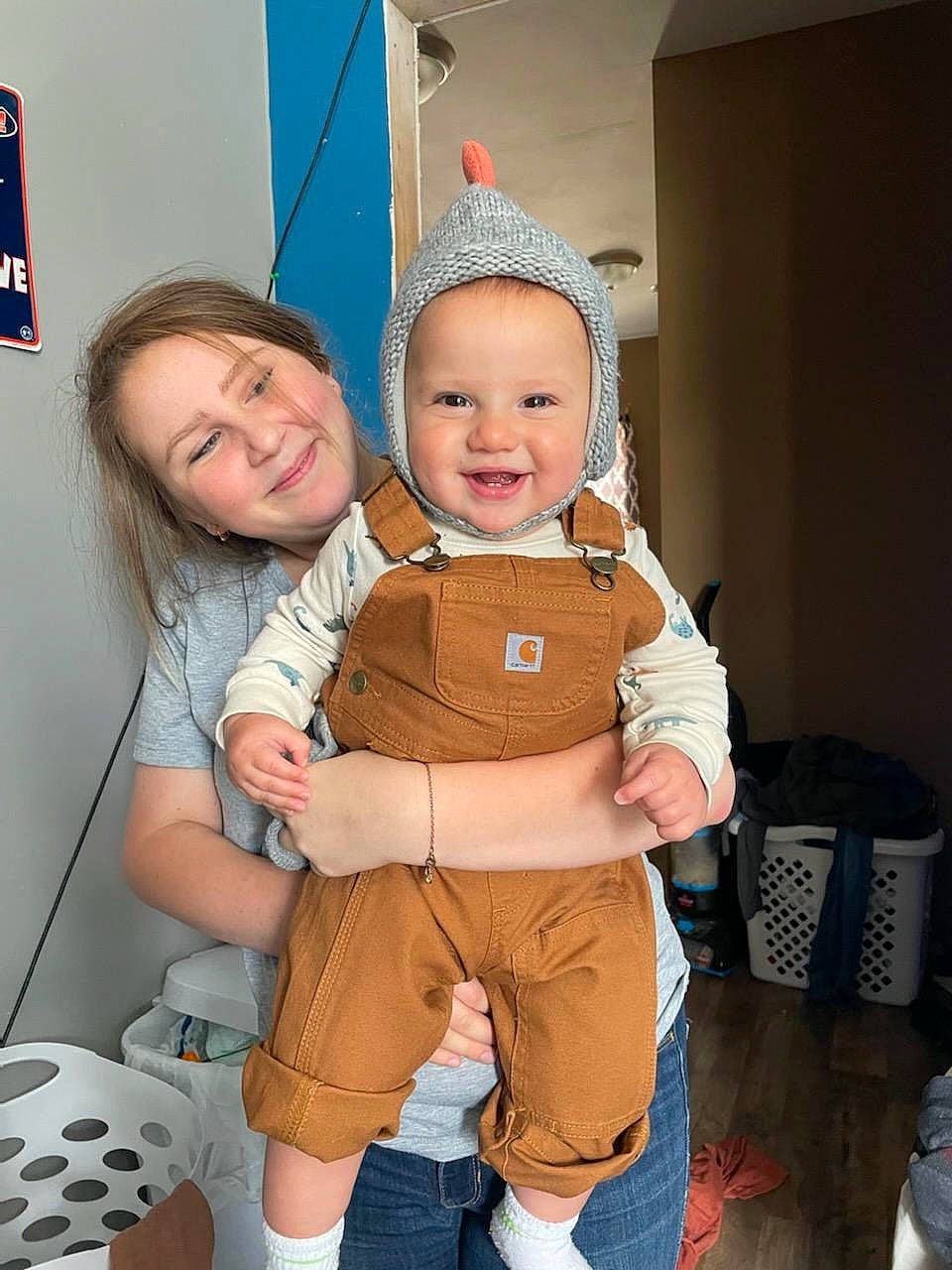 Oaklee is registered to the contest to win money with this photo: baby, child, costume, event, eye, face, facial_expression, fictional_character, flooring, fun, hairstyle, happy, head, human_body, joy, peach, person, personal_protective_equipment, skin, smile