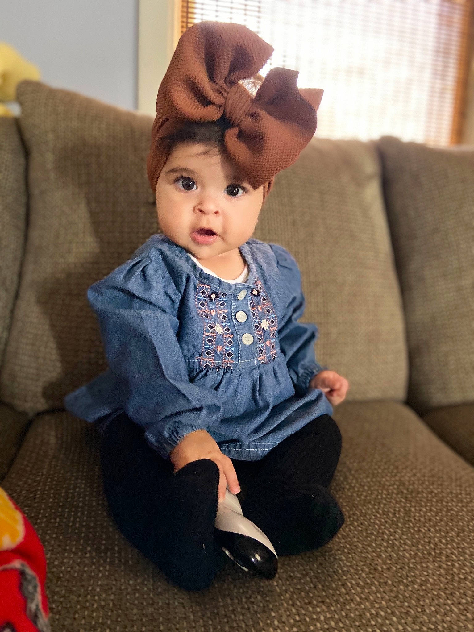 Amelie joined the competition — help win amazing prizes! baby, cheek, child, child_model, dress, ear, footwear, forehead, head, headgear, joint, outerwear, person, shoe, sitting, skin, sleeve, surprise, toddler