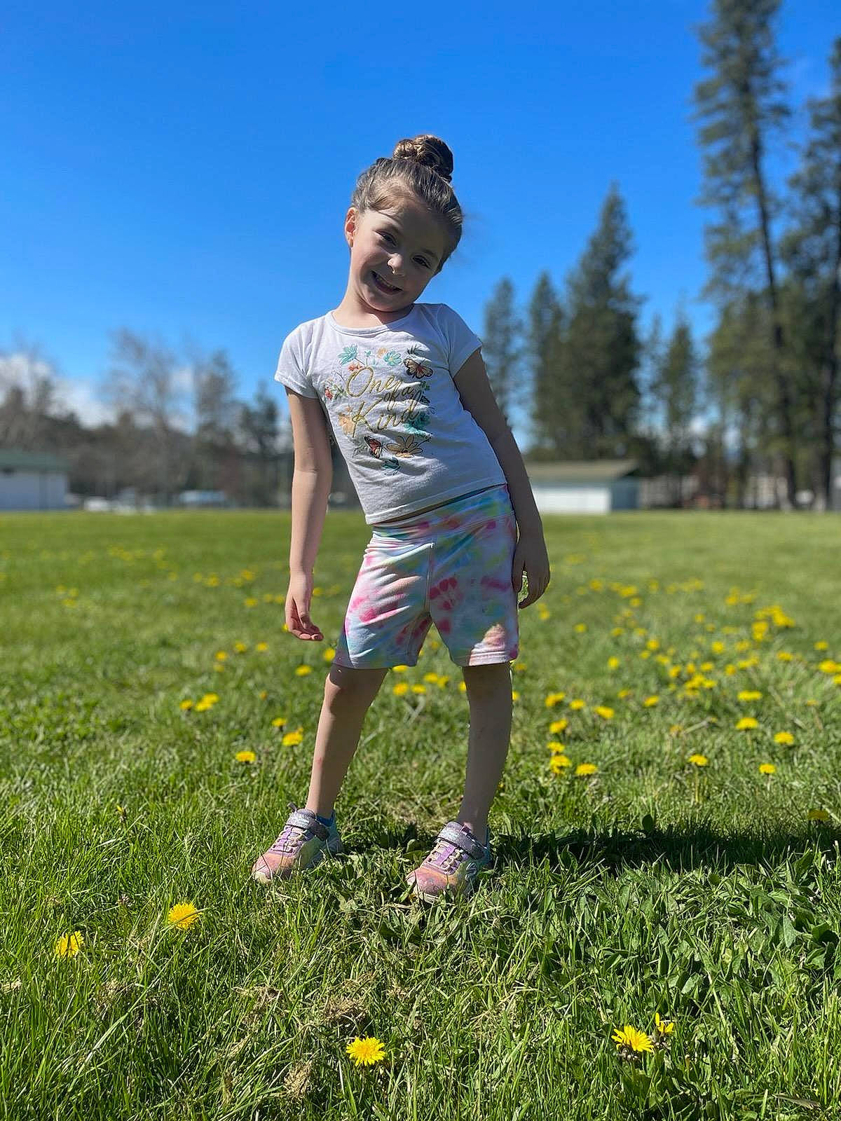 Xylie joined the competition — help win amazing prizes! electric_blue, flower, fun, grass, grass_family, grassland, happy, joy, landscape, lawn, leisure, meadow, natural_environment, people_in_nature, person, plant, prairie, recreation, sky, summer