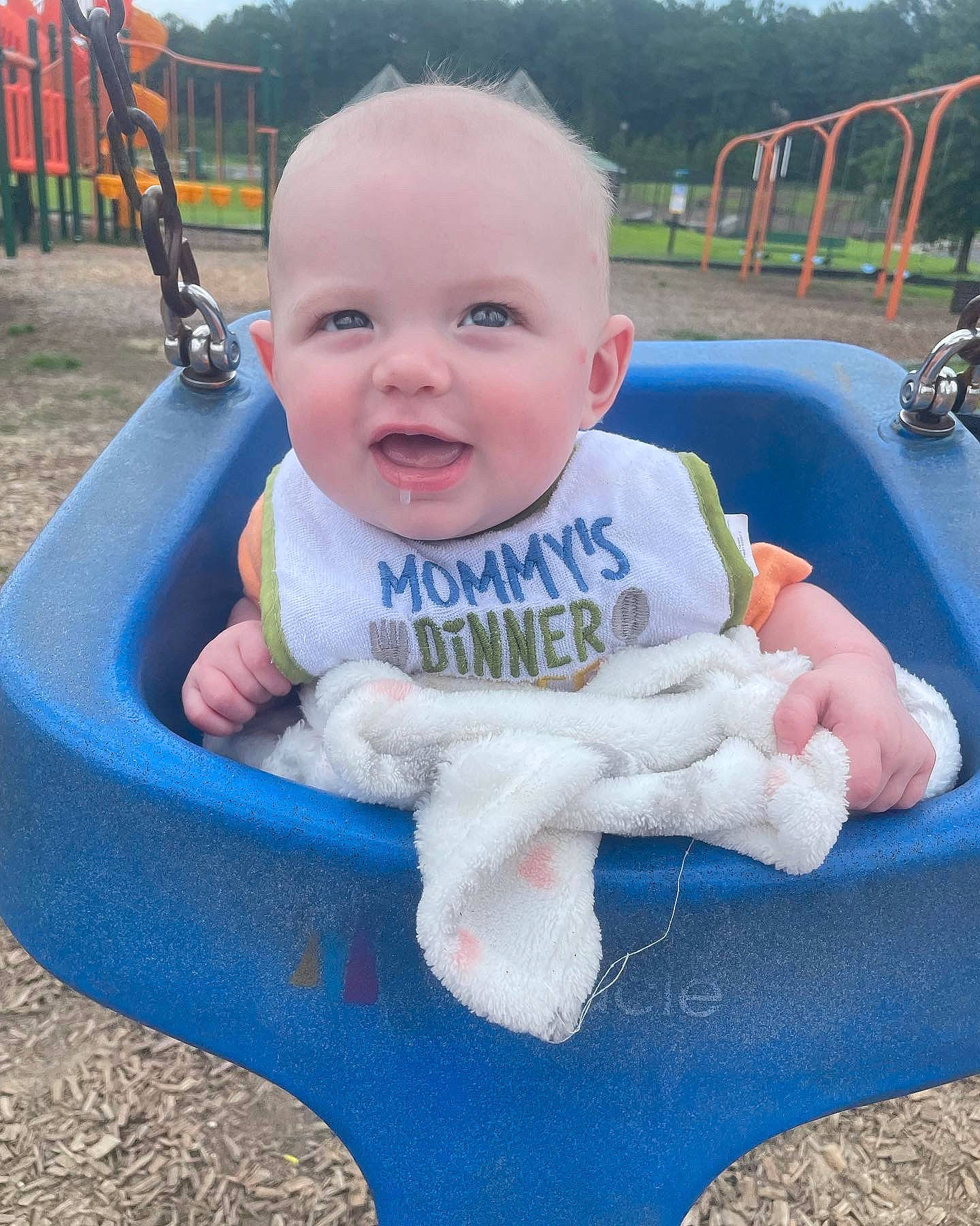 Dawson joined the competition — help win amazing prizes! baby, baby_toddler_clothing, blue, eye, facial_expression, fun, grass, hair, hairstyle, happy, human_body, leisure, person, plant, recreation, skin, sky, smile, swing, toddler