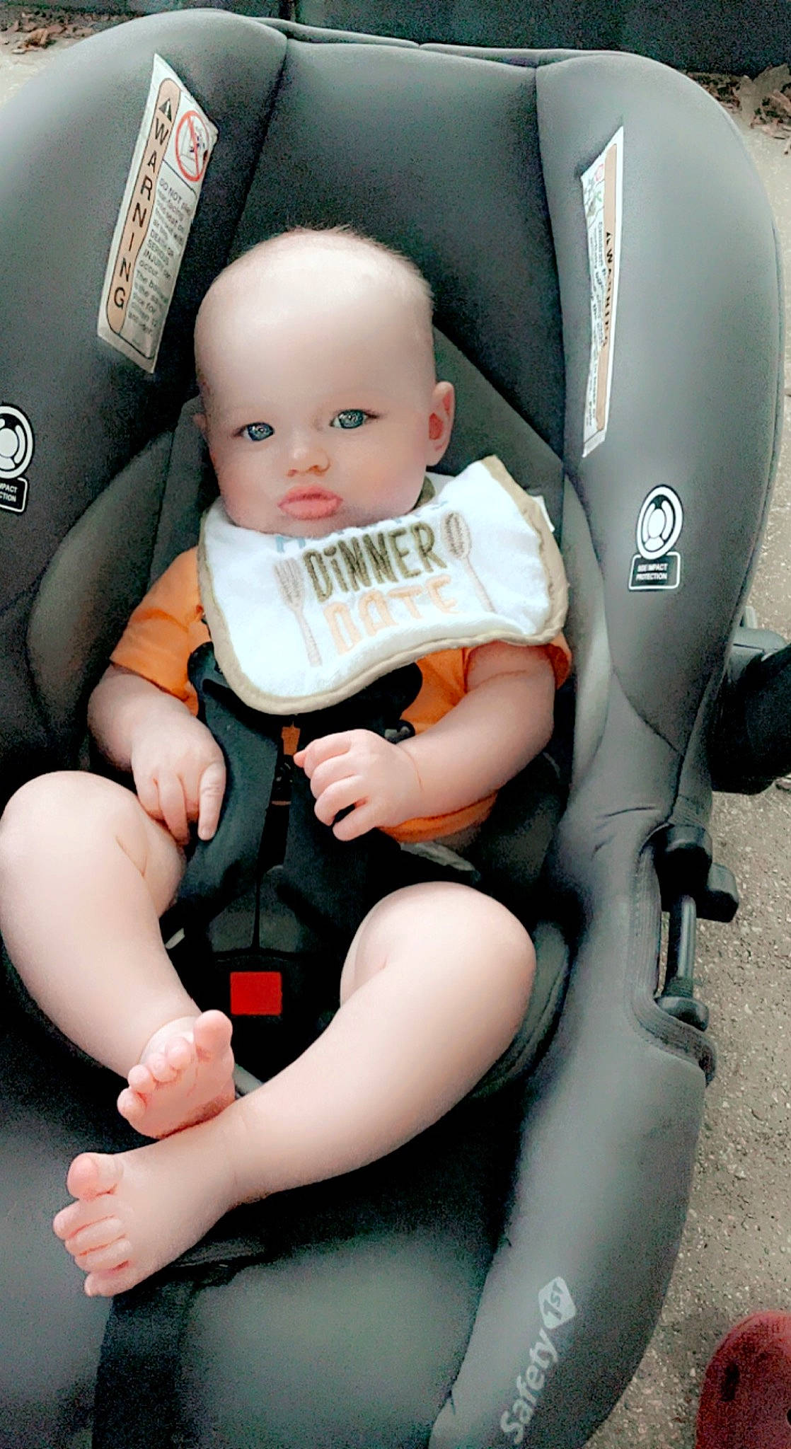Dawson is registered to the contest to win money with this photo: auto_part, baby, baby_in_car_seat, baby_products, baby_toddler_clothing, child, comfort, human_body, human_leg, knee, lap, leg, nail, person, service, sitting, skin, thigh, thumb, toddler