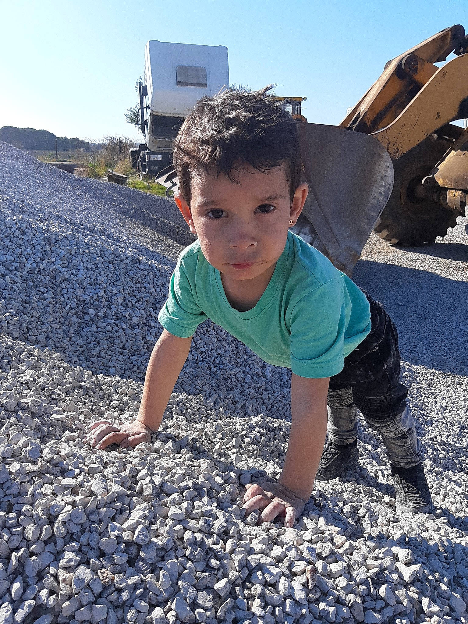 Pierre a rejoint le concours — aidez-le/la à gagner de superbes lots ! beach, child, fun, gravel, headwear, pebble, person, photography, play, rock, rubble, sand, summer, toddler, vacation