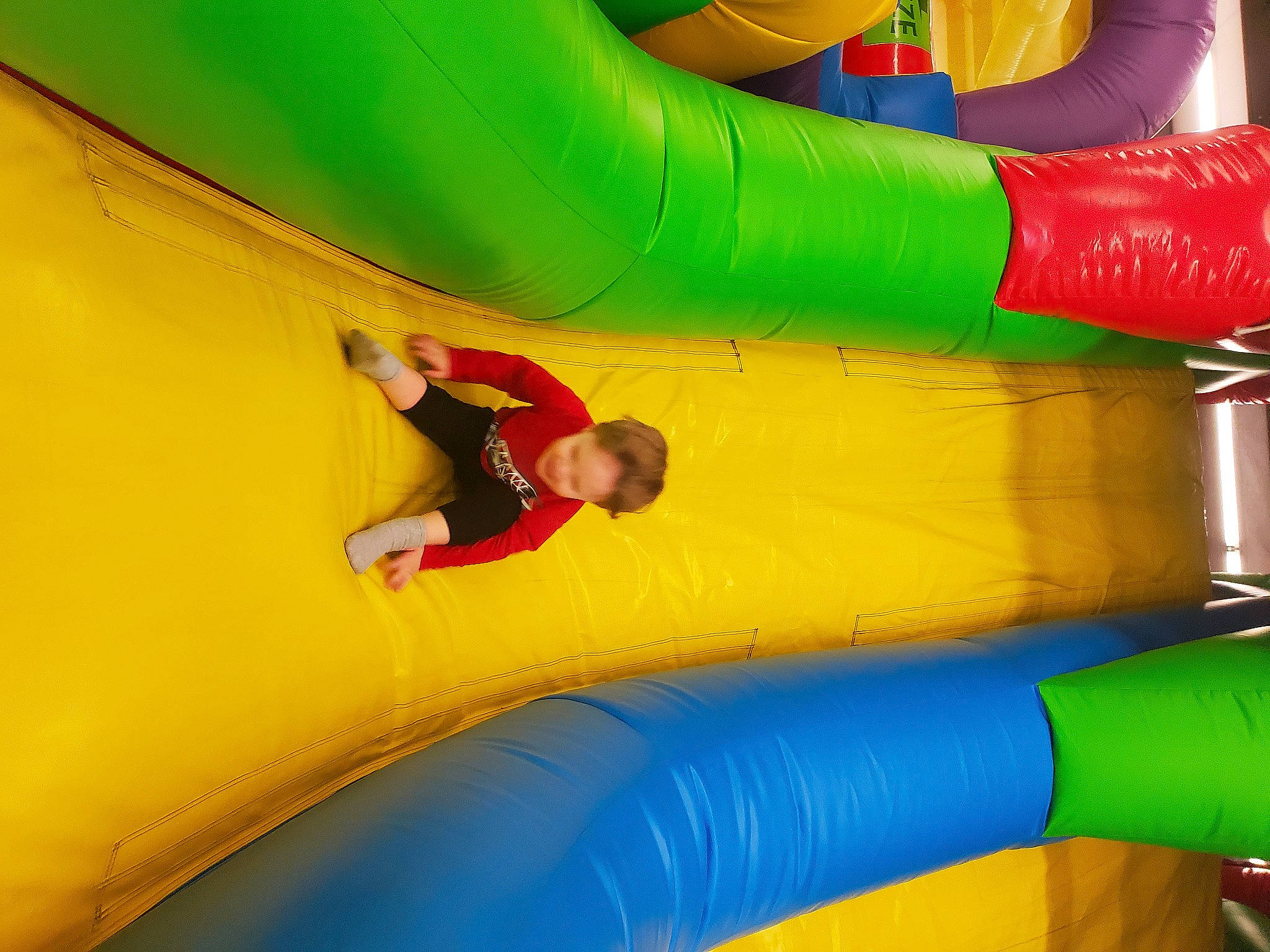 Sterling joined the competition — help win amazing prizes! blue, blurred, bounce_house, child, chute, electric_blue, fun, games, inflatable, leisure, nonbuilding_structure, outdoor_play_equipment, outdoor_recreation, person, photograph, play, playground, recreation, shorts, smile