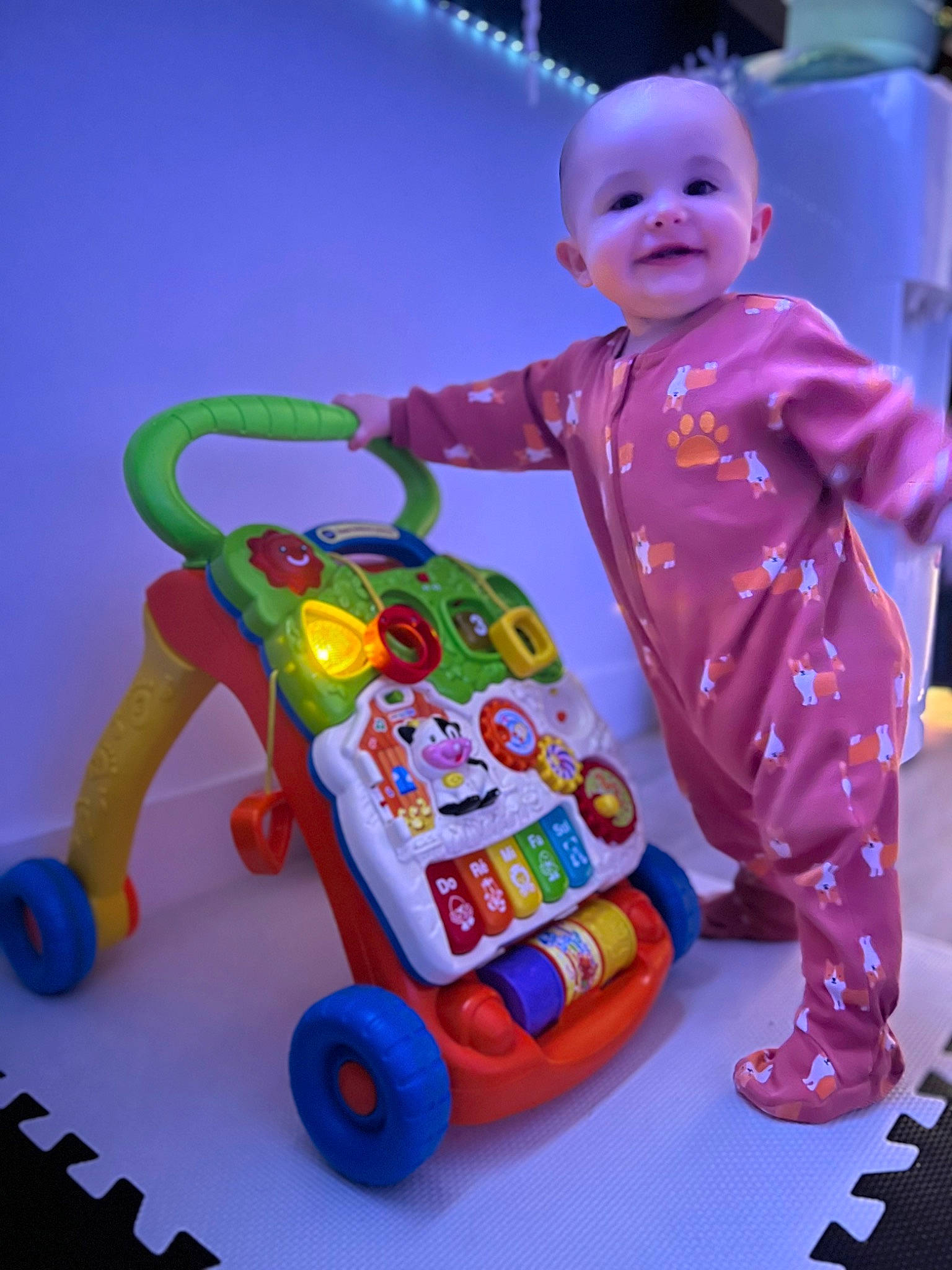 Mayson participe au concours pour gagner de l'argent avec cette photo : baby, baby_products, baby_toddler_clothing, baby_toys, child, electric_blue, fun, magenta, person, pink, plastic, play, product, purple, riding_toy, smile, tire, toddler, toy, wheel