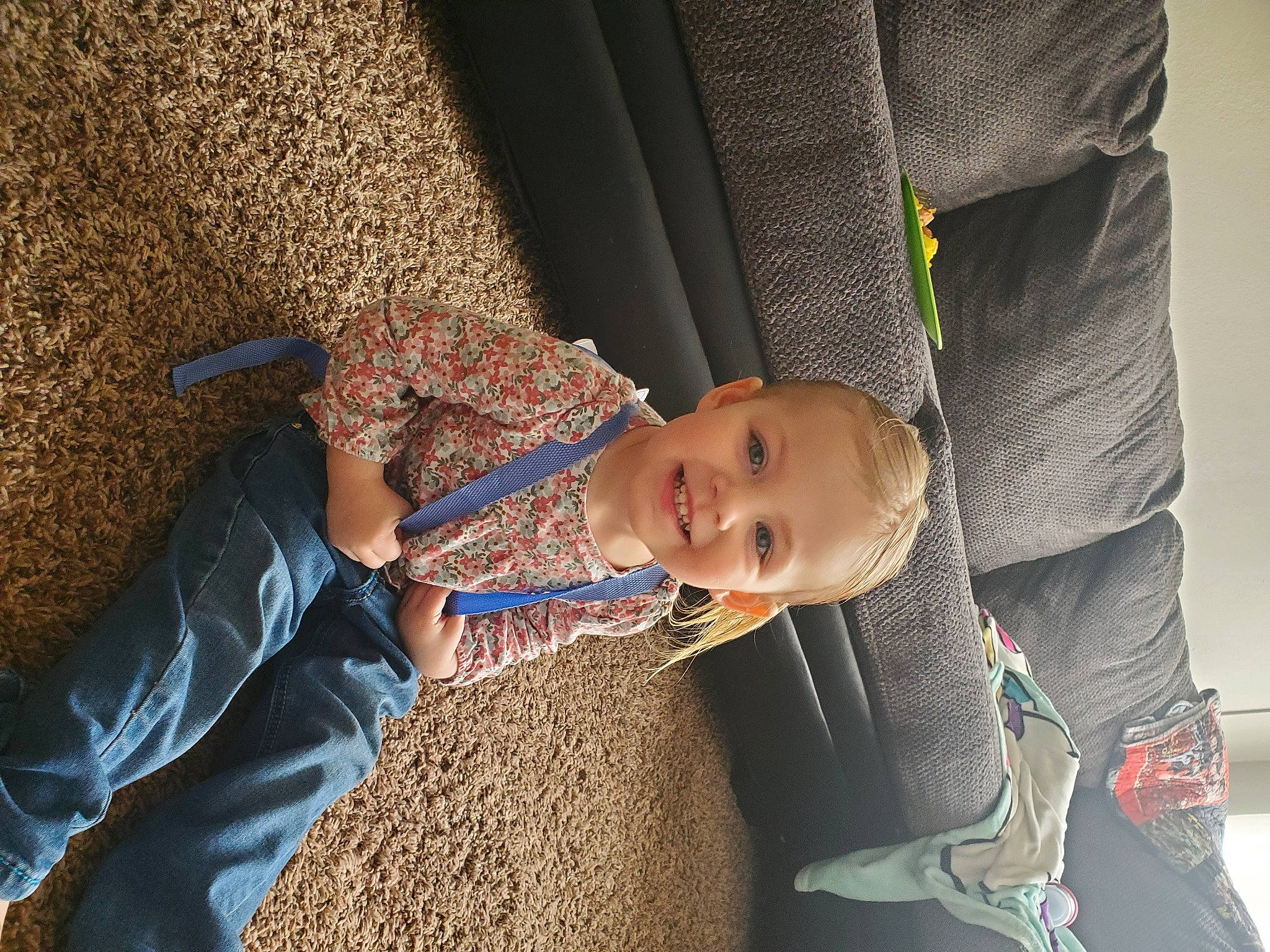 Paislee joined the competition — help win amazing prizes! baby, child, comfort, electric_blue, flooring, fun, grass, happy, hat, joy, leisure, pattern, people_in_nature, person, shadow, sitting, smile, soil, textile, toddler