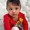Arianna joined the competition — help win amazing prizes! toddler, child, red_shirt, minnie_mouse, ball_pit, white_balls, curious, indoors, cute, portrait, playful, young_child, face, long_sleeve, childrens_clothing, casual_wear, expression, person, bright_colors, fun