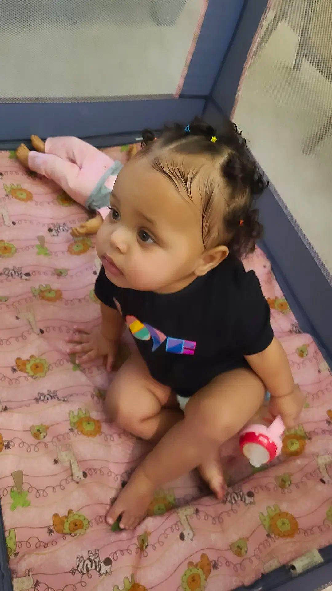 Juliet is registered to the contest to win money with this photo: baby, baby_toddler_clothing, cheek, child, eye, face, finger, flooring, foot, fun, happy, head, human_body, iris, person, pink, product, skin, thigh, thumb