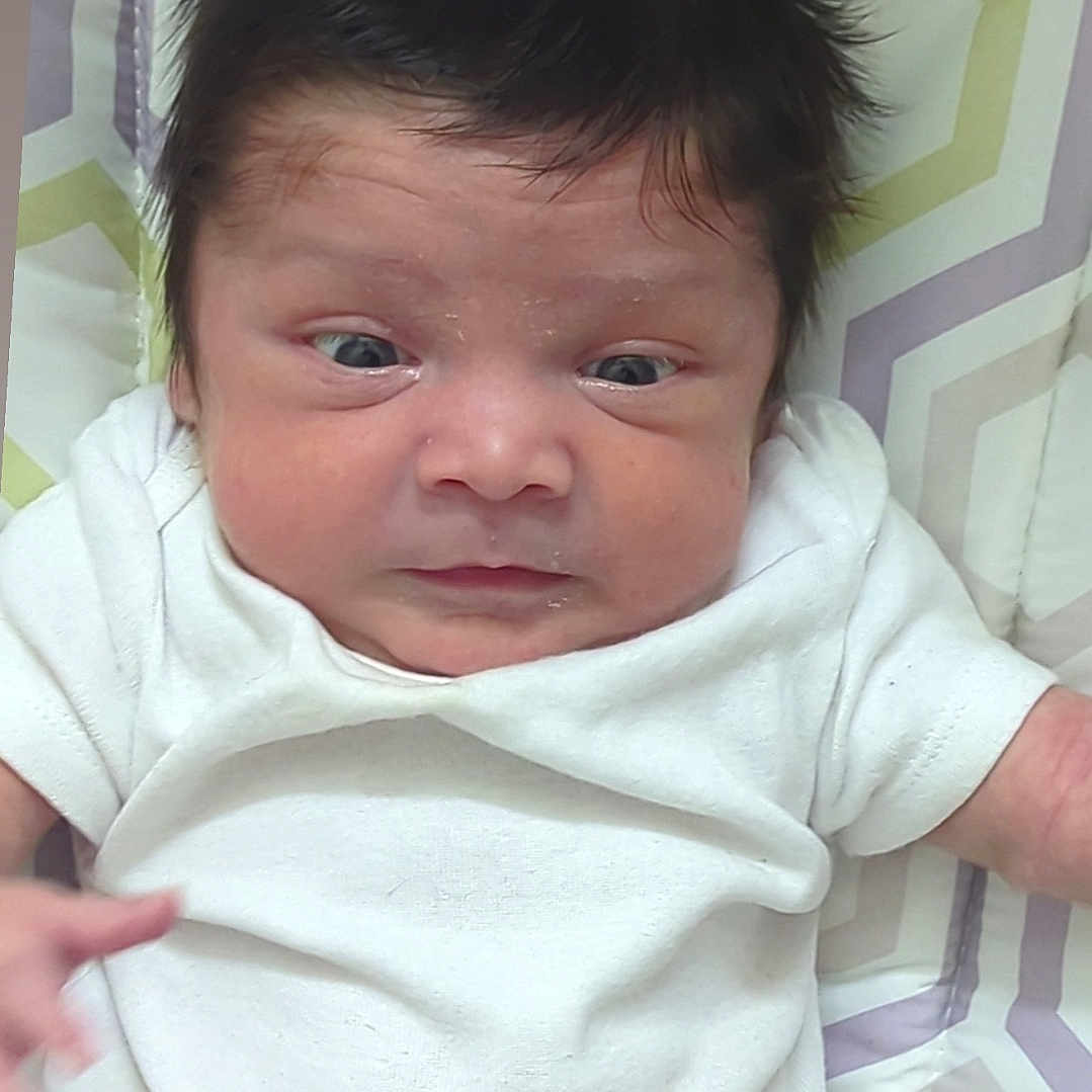 Remi joined the competition — help win amazing prizes! baby, bed, blanket, bodypart, clothing, crib, cushion, face, finger, furniture, hand, head, homedecor, infantbed, newborn, person, photography, portrait, sleeping, t_shirt