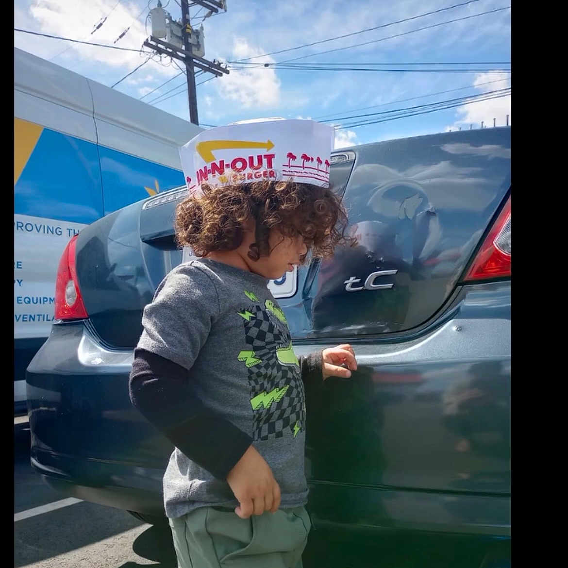 Divine joined the competition — help win amazing prizes! baby, car, curlyhair, face, hair, head, hugging, person, pushing, transportation, vehicle