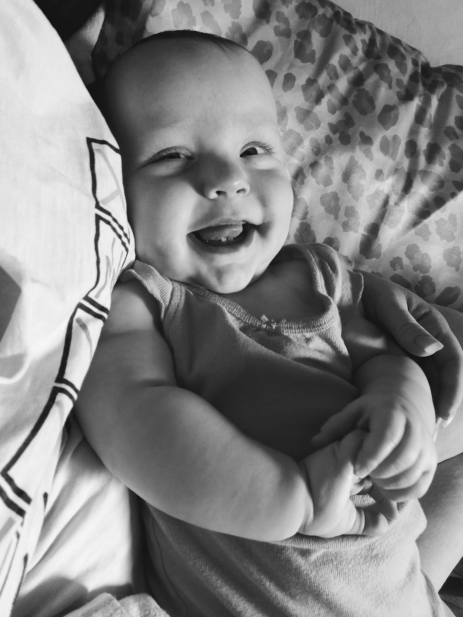 Isabella joined the competition — help win amazing prizes! baby, baby_products, baby_toddler_clothing, black_and_white, child, comfort, flash_photography, fun, gesture, hairstyle, happy, laugh, linens, monochrome, monochrome_photography, person, sitting, smile, stock_photography, style