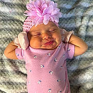 Amari joined the competition — help win amazing prizes! baby, infant, pink_onesie, headband, flower_headband, sleeping, arms_behind_head, blanket, soft_texture, cute, peaceful, relaxed, portrait, human, child, indoors, newborn, skin, small_hands, adorable